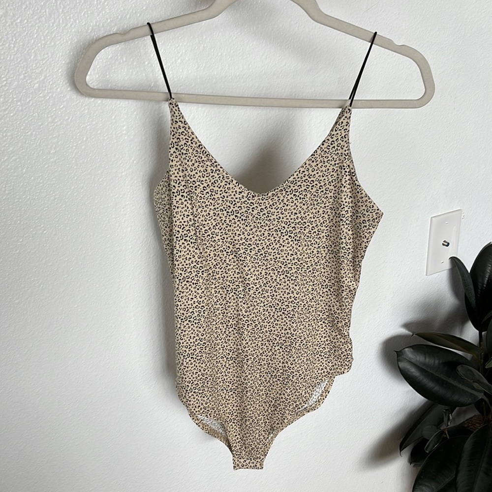 Leopard print body suit